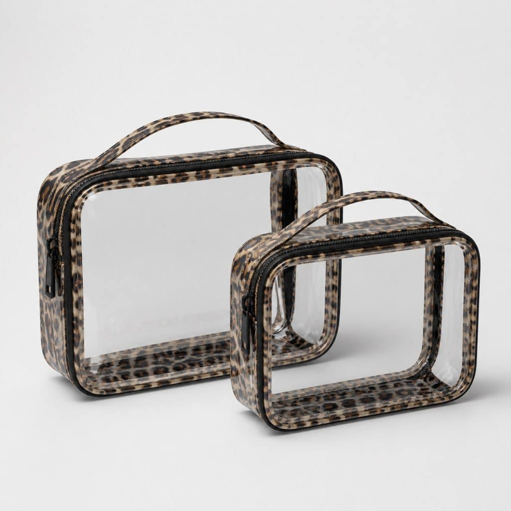 Duo de trousses transparentes à motif léopard sur fond blanc