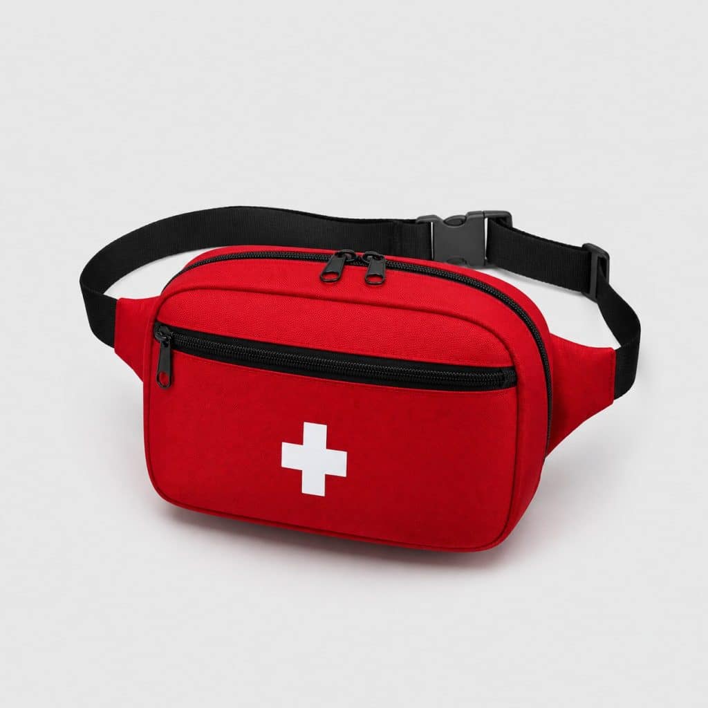 Trousse de premiers secours en sac banane rouge fermée