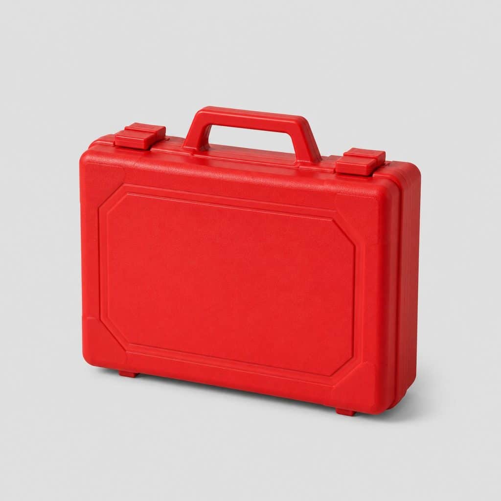 Mallette rigide rouge de premiers secours fermée avec poignée
